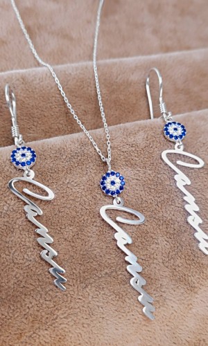 925 Ayar Gümüş 2li Takım Nazar Boncuklu Isim Kolye Ve Küpe Zirkon Taşlı 925 Ayar Gümüş 2li Takım Nazar Boncuklu Isim Kolye Ve Küpe Zirkon Taşlı