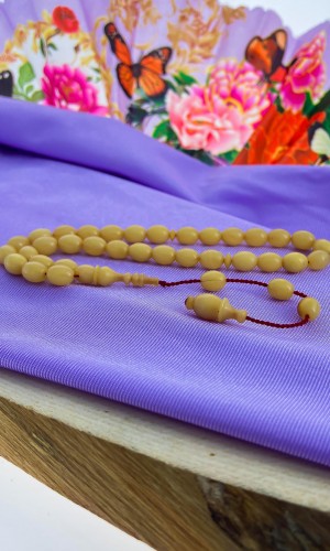 Beyaz Renk Hareli Sistemli Püskül Sıkma Kehribar Tesbih