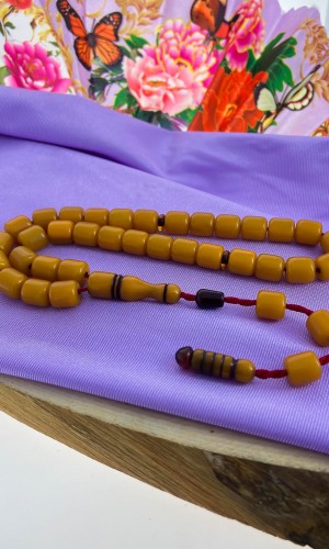 Sarı Renk Tekerlek Sistemli Püskül Sıkma Kehribar Tesbih