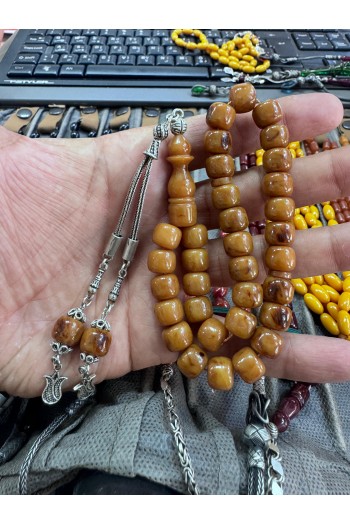 925 ayar gümüş püsküllü tekerlek  kesim bağa sıkma kehribar 