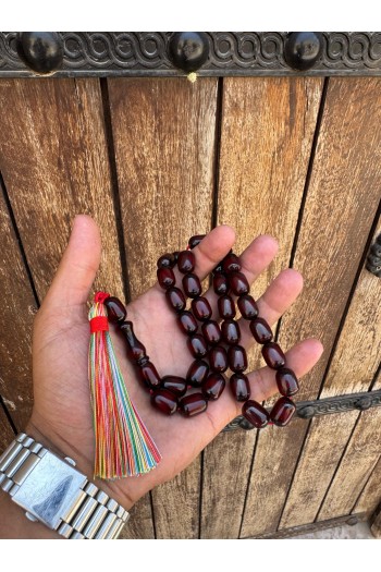 ip püsküllü dizayn temiz işçilikli büyük ölçü fırınlanmış sürmeli sıkma kehribar