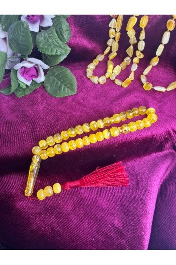 Damla Kehribar ip püsküllü hafif fosilli tekerlek model tesbih 